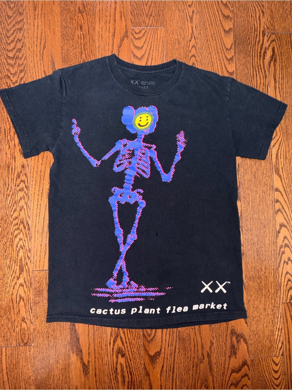 Cactus Plant Flea Market X Kaws tee